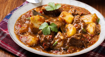 Beef,Stew,With,Potatoes,In,A,Plate